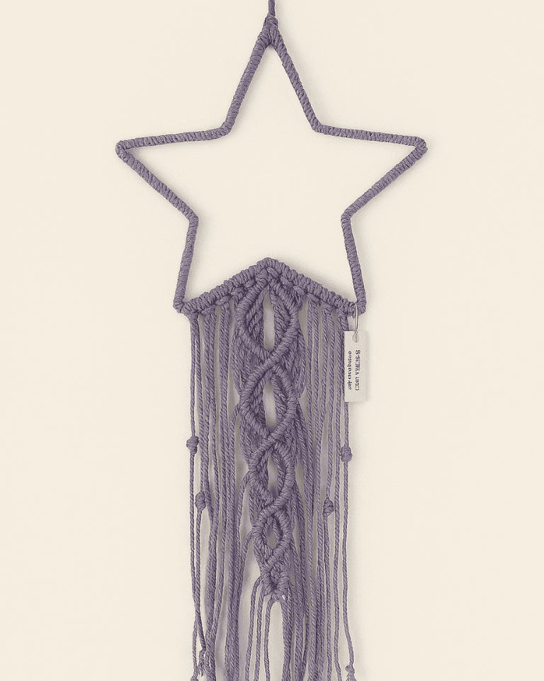 Lavender purple macramé star wall hanging in boho style with knotted center and long fringe – Samra Knots handmade decor.