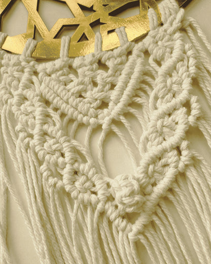 Close-up of handcrafted Islamic macramé wall hanging featuring detailed cotton knots and a gold crescent ayah plate – Samra Knots