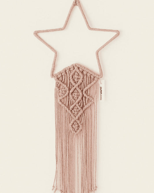 Blush pink macramé star wall hanging with intricate boho knots and fringe – handmade by Samra Knots.