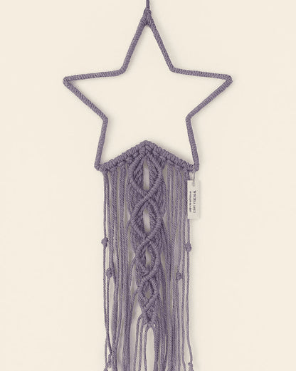 Lavender purple macramé star wall hanging in boho style with knotted center and long fringe – Samra Knots handmade decor.