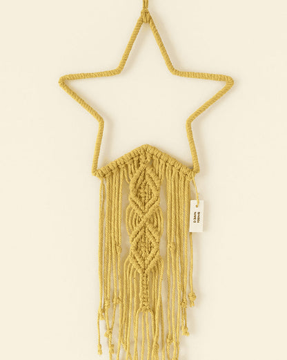 Handmade mustard yellow macramé star wall hanging with fringe and decorative knots – cozy boho decor by Samra Knots.
