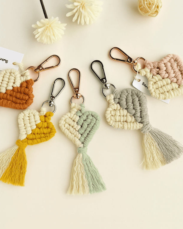 A variety of macramé heart keychains in pastel and earthy colours – Samra Knots